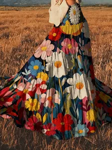 Detail van een elegante bohemian maxi-rok met levendige bloemenprint in een olieverfstijl