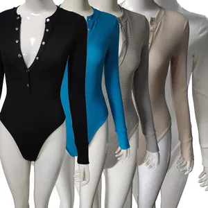 Close-up of long sleeve ribbed bodysuits in various colors with buttoned henley neck
