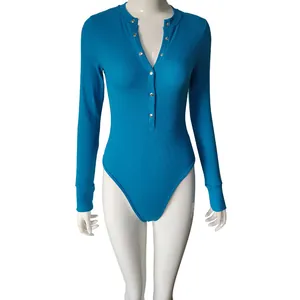 Full detail view of a blue long-sleeved ribbed henley bodysuit on a female mannequin