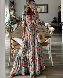 Robe longue bohème à fleurs avec col en V élégant et jupe à volants pour le printemps
