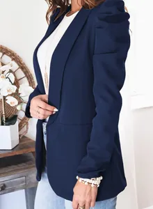 Detailed side view of an elegant navy blue blazer featuring stylish puff sleeve design