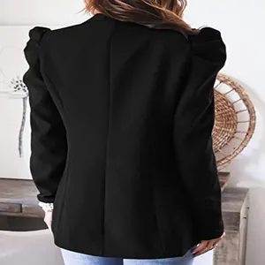 Detailed back view of a women's black long sleeve blazer with puff shoulders