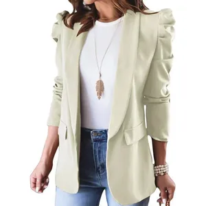 Front view of women's light beige blazer with puffed shoulders and lapel collar