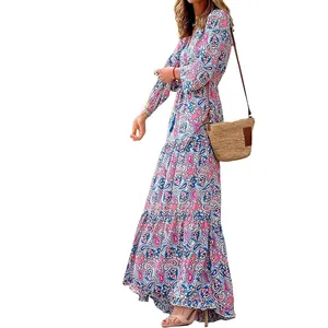 Detailed view of bohemian floral maxi dress with tiered skirt and long sleeves