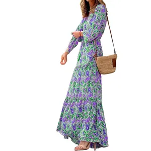 Detailed view of the vibrant paisley print on this V-neck Bohemian maxi dress.