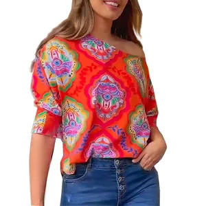 Vibrant women's one-shoulder loose blouse with intricate geometric mandala print