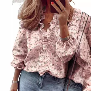 Blusa a fiori a maniche lunghe con eleganti volant