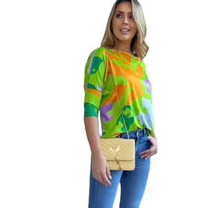 Vibrant geometric print long sleeve t-shirt for women, loose casual spring summer top.