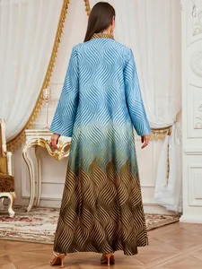 Close-up detail of the elegant blue and brown wavy digital print on this long robe