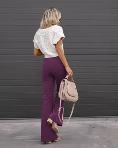 Back view detail of women's stylish purple high waist corduroy flare pants for spring