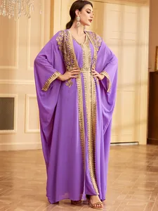 Full view of an elegant purple kaftan dress with intricate golden sequin embroidery