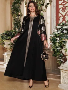 Elegant black long dress with floral sequin embroidery and gold sequin detail