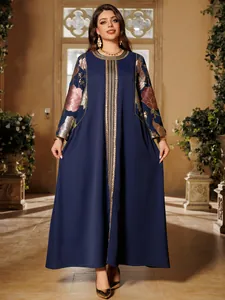 Elegant navy blue kaftan dress featuring colorful sequin floral embroidery on sleeves