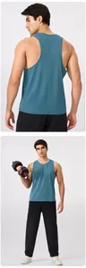 Débardeur de sport en modal pour homme bleu sarcelle, vue arrière et détail entraînement