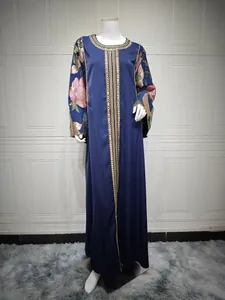 Elegant navy blue long-sleeved Abaya maxi dress featuring gold sequin floral embroidery.