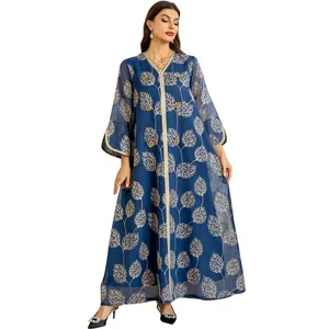 Elegant blue mesh maxi dress with gold leaf embroidery and handmade beaded details