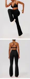 Detailweergave van de zwarte yogaset met cross-back beha en een uitlopende legging