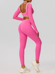 Set yoga rosa 2 pezzi con top corto a maniche lunghe e leggings a vita alta