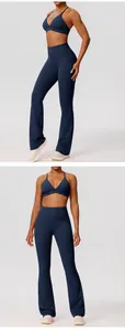 Marineblauw yoga-set bestaande uit sport-bh en flared legging met hoge taille.