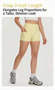 High-waisted yellow women's yoga shorts with convenient side pocket for fitness.