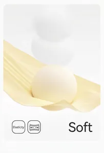 Close-up of soft yellow fabric showing high elasticity for women's yoga shorts