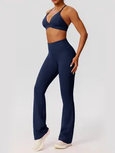 Tweeledig marineblauw yoga-set met sportbeha en uitlopende leggings met hoge taille