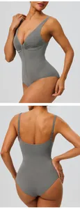 Front and back view of grey seamless tummy control shapewear bodysuit with zipper