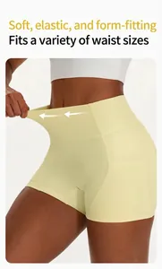Detail shot of pale yellow high-waisted yoga shorts showing high elasticity waistband.