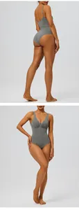 Seamless grey shapewear bodysuit with front zipper and adjustable straps for tummy control