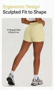 High-waist yellow yoga shorts with side pockets and M-shaped butt-lifting seam detail