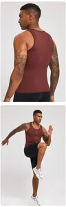 Action shot of men's slim fit maroon zip-up athletic tank top for gym and running