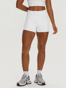 Women's high waisted white yoga shorts with side pockets for gym and fitness training