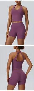Front and back detail of purple yoga set featuring halter bra and lifting shorts