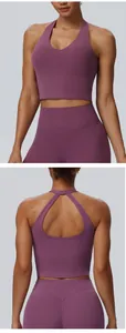 Detail view of a purple racerback sports bra and high-waist fitness leggings set.