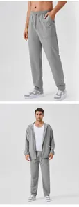 Vues d'ensemble et de détail de l'ensemble de sport gris coupe-vent pour hommes en 2 pcs