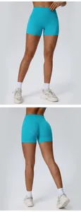 Gedetailleerde voor- en achteraanzichten van turquoise yoga shorts met hoge taille voor dames
