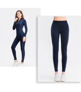 Navy blue high-waisted fleece yoga leggings and sports top with blue stitching detail