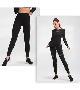 Full-length view of women's black high-waisted yoga leggings and long-sleeved top set.