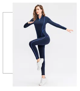 Gedetailleerd overzicht van dames yoga-top met rits en blauwe contrastnaden voor fitness