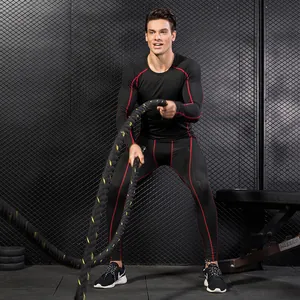 Men's professional compression sports suit for gym training with battle ropes exercise