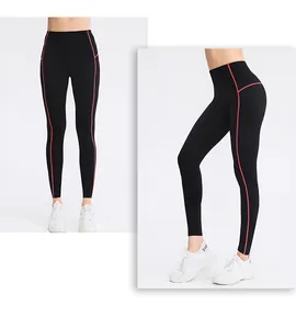 Detailed views of black high-waisted yoga leggings with red contrast stripes