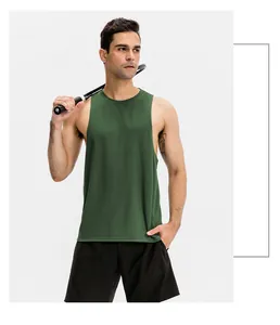 Close-up of a man wearing a breathable dark green athletic tank top with a tennis racket.