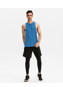 Full view of blue athletic tank top for men on model in studio setting.