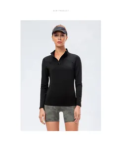 Front view of a black slim-fit women's quarter-zip long sleeve performance sports top