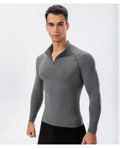 Grijs heren sportshirt met lange mouwen, elastische compressie en opstaande kraag rits