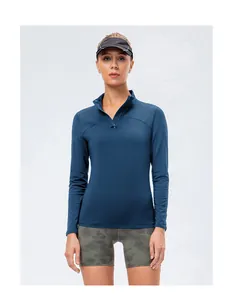 Detailed front view of women's navy blue half-zip fleece long sleeve athletic sports top