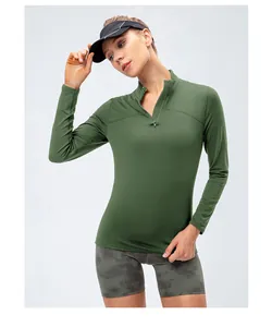 Slim fit women's fleece-lined sports sweatshirt with quarter-zip and stand collar.