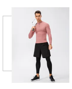 Heren thermisch sportshirt met lange mouwen en compressiepanty set volledige look aan