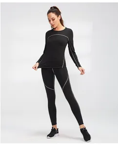 Schwarzes Thermo-Yoga-Set für Damen mit markanten weißen Kontrastnähten im Detail
