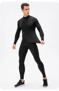 Men's black compression fitness set with half-zip long sleeve top and training pants